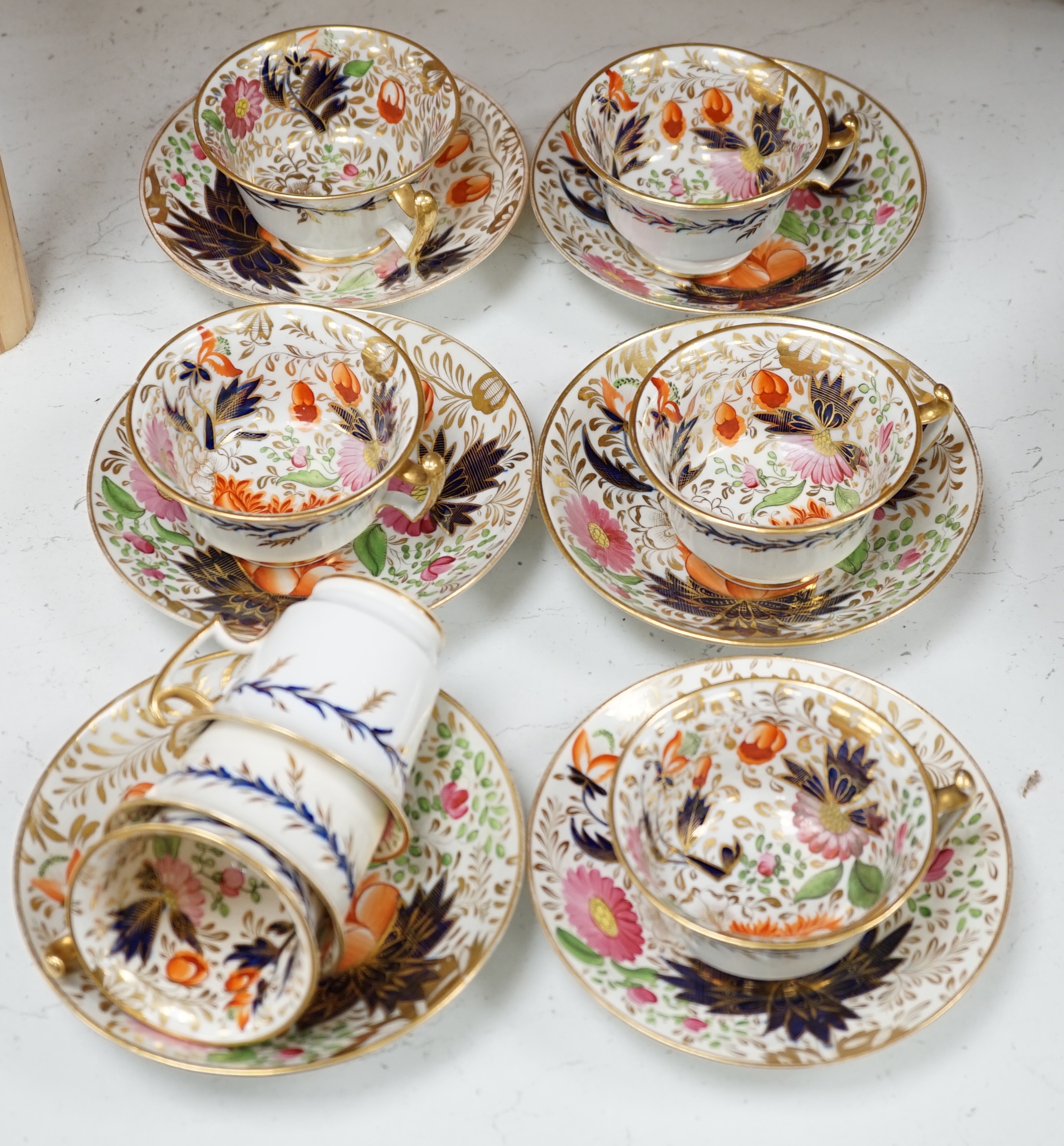 An early 19th century London shape part tea set, probably Coalport. Condition - some damage